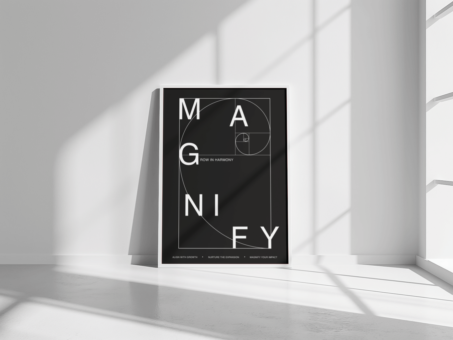 Poster with 'MAGNIFY' text on a black background in a minimalistic room.