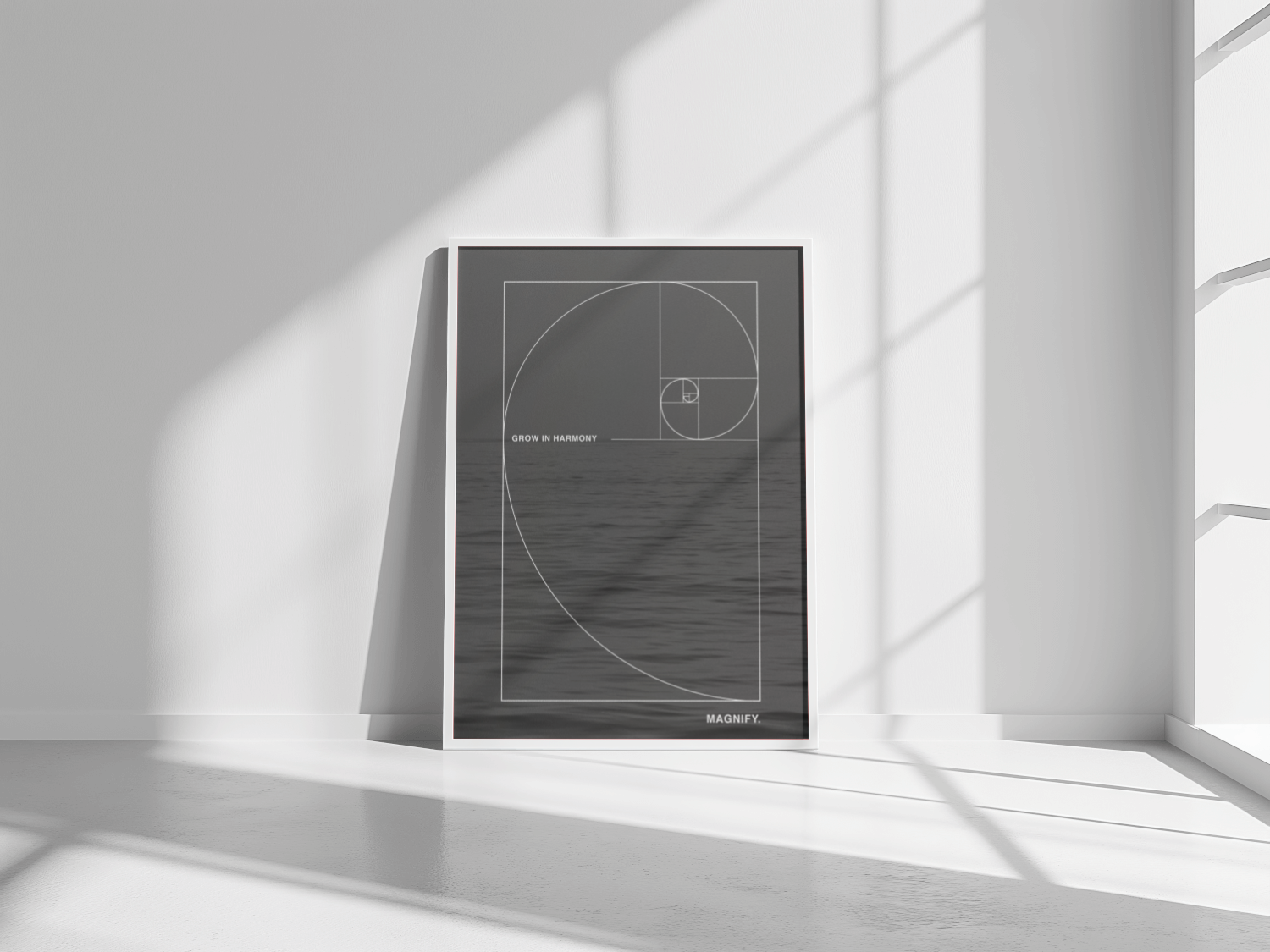 Framed artwork with geometric design on a white wall