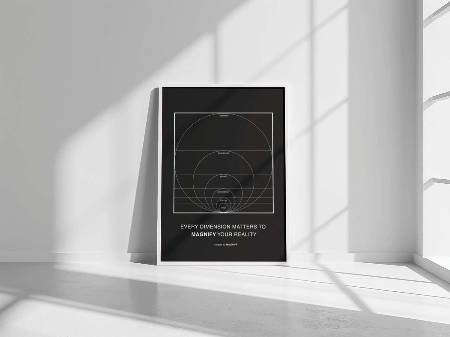 Framed poster with motivational quote in a minimalistic room with sunlight filtering through.