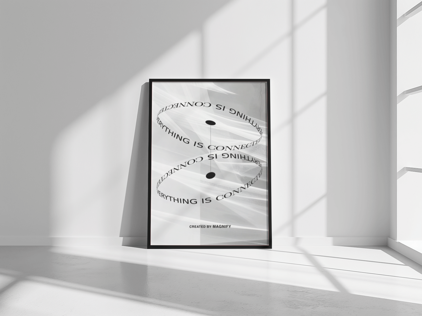 Framed poster with text on a white wall in a minimalistic room