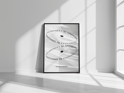 Framed poster with text on a white wall in a minimalistic room