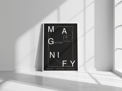 Poster with 'MAGNIFY' text on a black background in a minimalistic room.